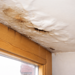 Ceiling interior with smooth drywall and no visible water damage after roof leak repair