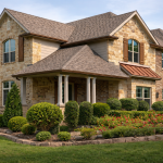 Two-story Texas home with stone and brick exterior and clean asphalt shingle roof representing increased property value
