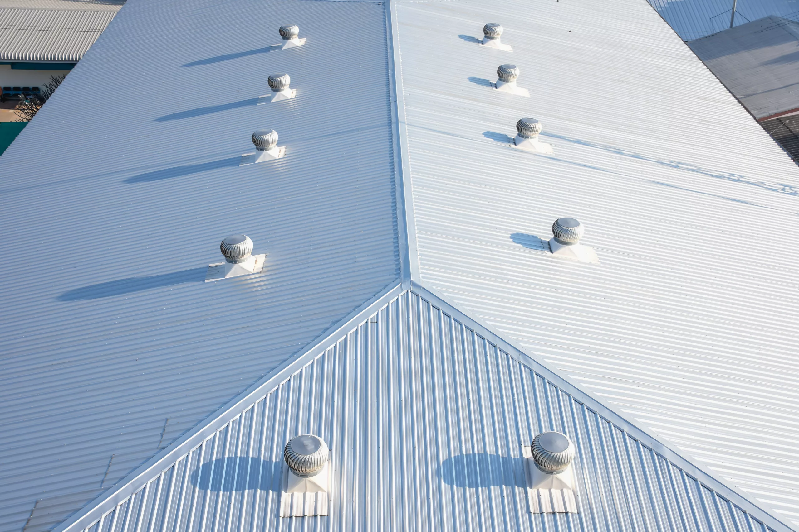 White commercial roof with vents from above