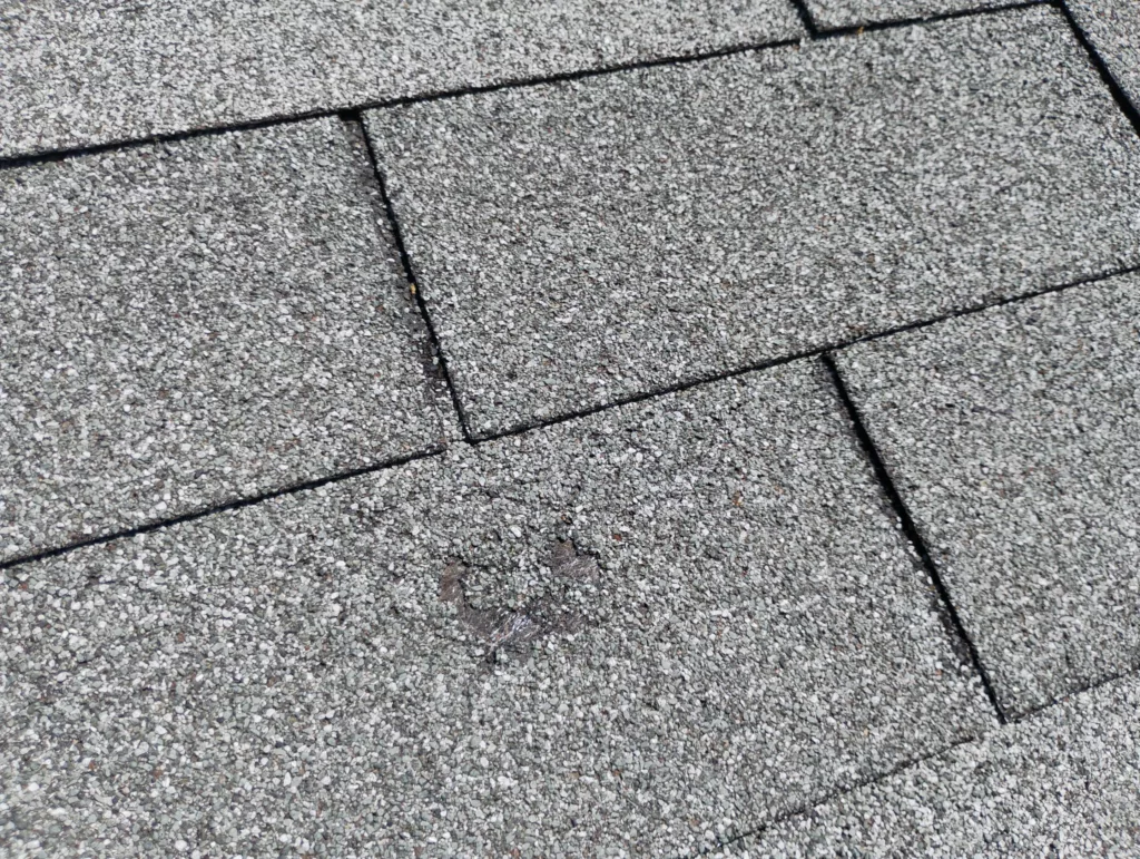 roof--hail-damage-in-Hollis-Dr-Abilene-TX 76825-by-Legacy-Roofing-Pros-needing-roof-repair