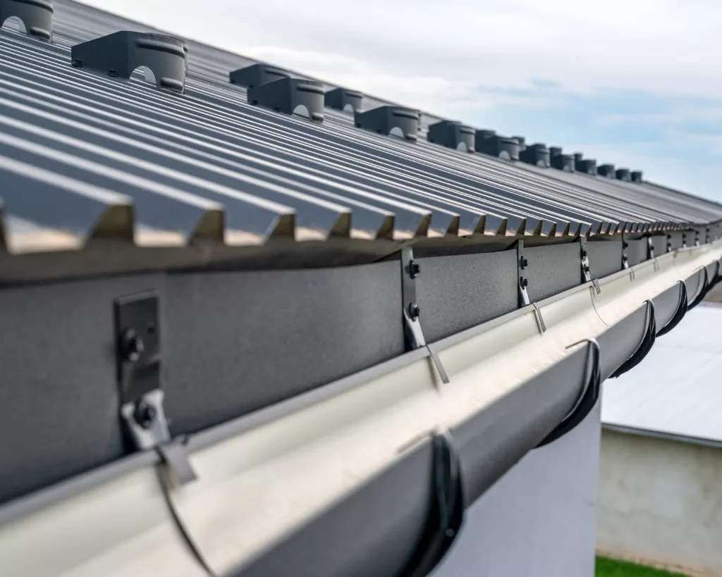 Metal gutters for metal roof