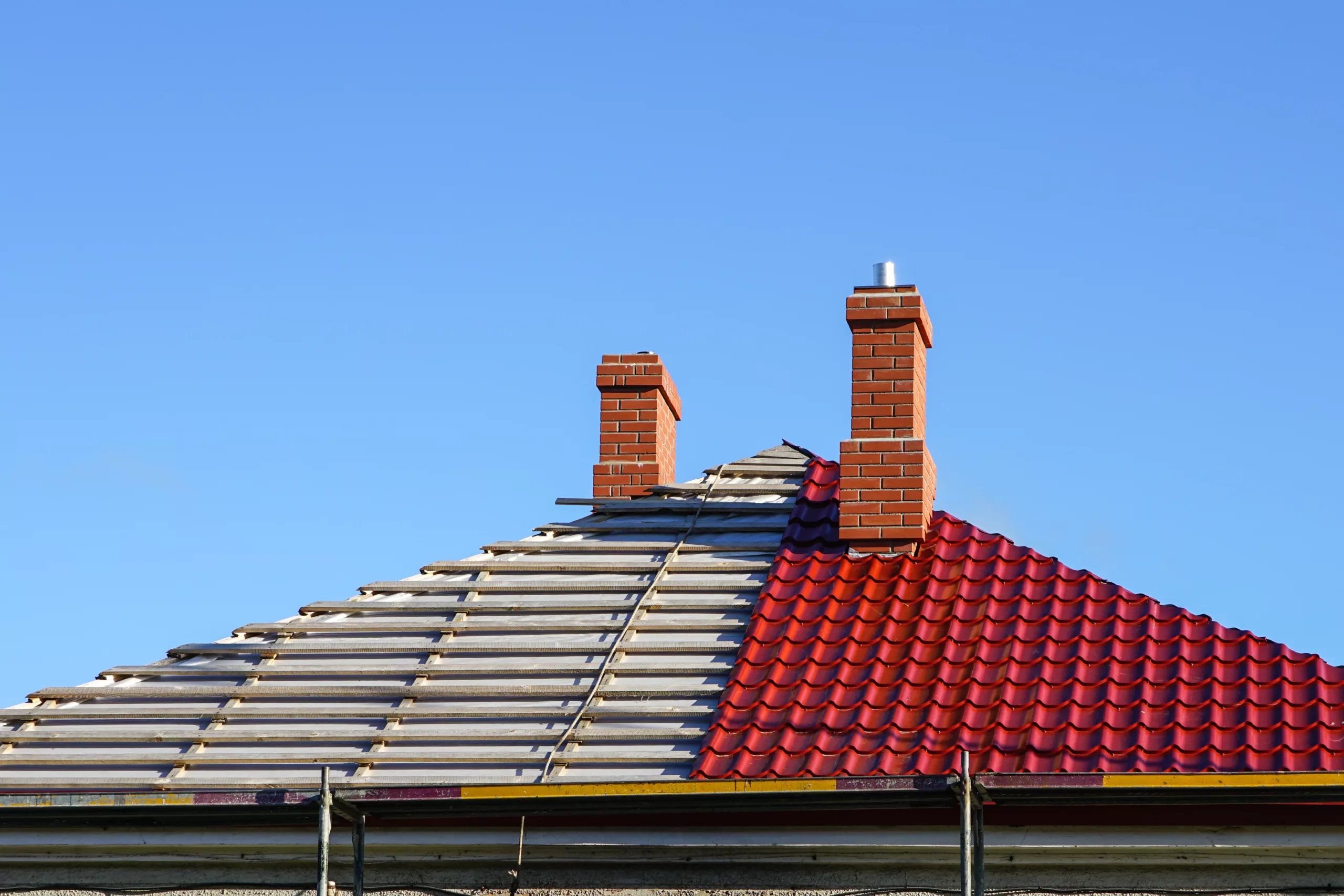 Red tile roof half replaced